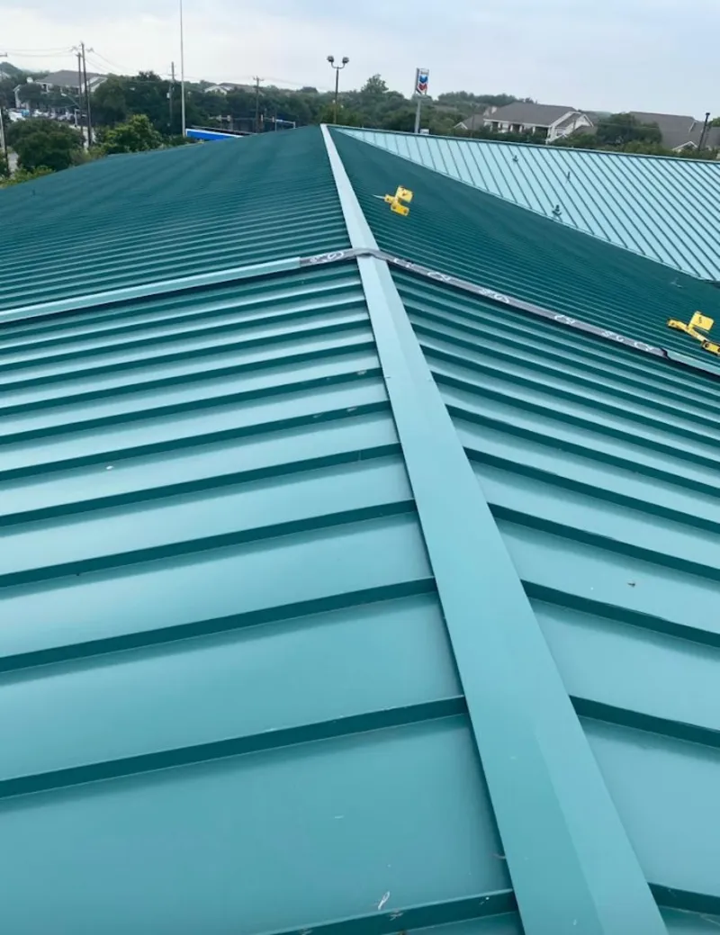 Green commercial metal roof ridge and valley for Metal Roof Repair in Mascoutah